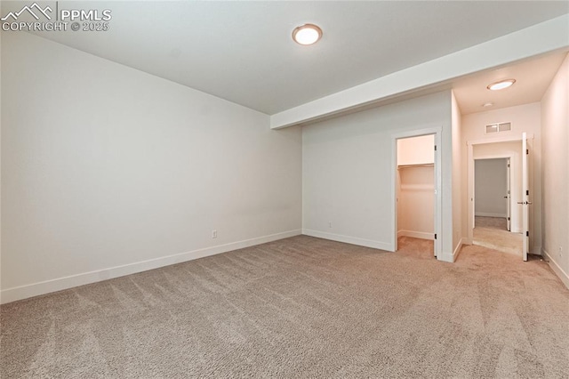4261 Horse Gulch Loop, Colorado Springs, CO 80924 - unfurnished bedroom featuring carpet flooring, baseboards, a spacious closet, and a closet