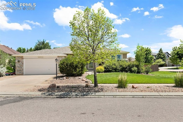 10211 Murmuring Pine Ct, Colorado Springs, CO 80920 - view of property hidden behind natural elements with a garage, concrete driveway, and a front lawn