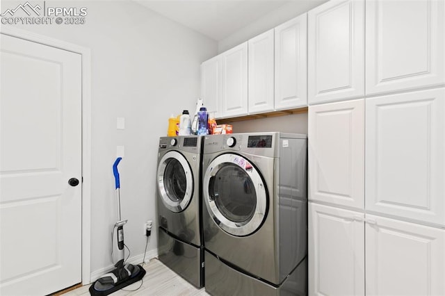 10211 Murmuring Pine Ct, Colorado Springs, CO 80920 - laundry room featuring cabinet space and independent washer and dryer