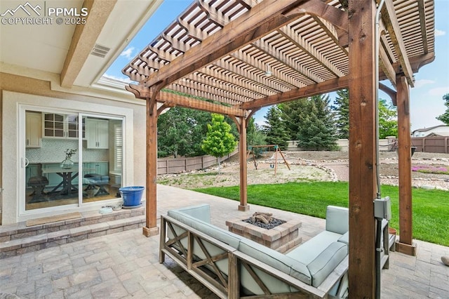 10211 Murmuring Pine Ct, Colorado Springs, CO 80920 - fenced backyard featuring a patio, an outdoor fire pit, a pergola, and a playground