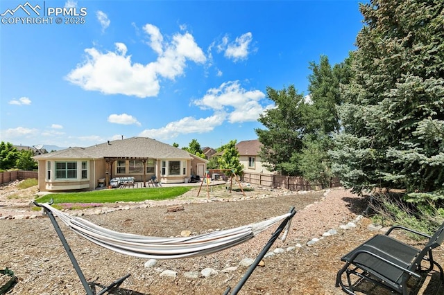 10211 Murmuring Pine Ct, Colorado Springs, CO 80920 - back of house featuring a patio area