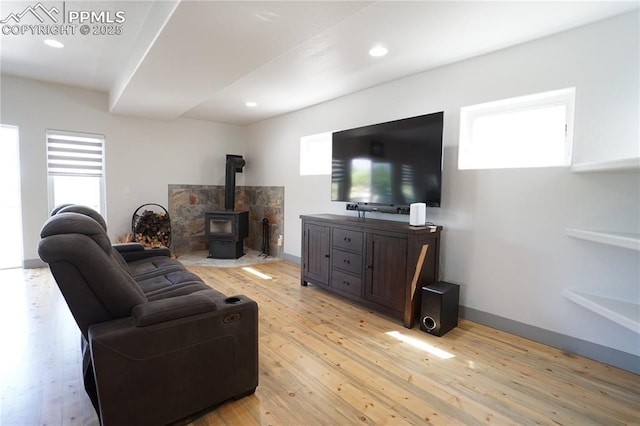 1407 Manitou Blvd, Colorado Springs, CO 80904 - living area with a wood stove, light wood-type flooring, and recessed lighting