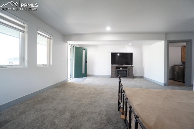 1407 Manitou Blvd, Colorado Springs, CO 80904 - unfurnished living room featuring light colored carpet and recessed lighting