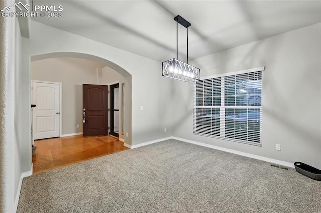 13080 Mt Harvard Dr, Peyton, CO 80831 - carpeted spare room featuring arched walkways and baseboards