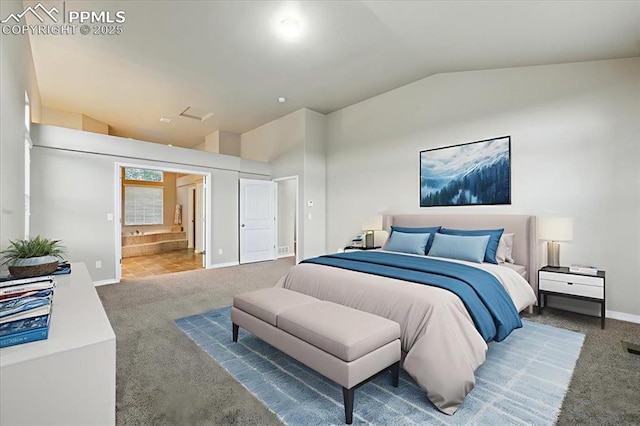 13080 Mt Harvard Dr, Peyton, CO 80831 - bedroom featuring carpet floors, vaulted ceiling, and ensuite bath