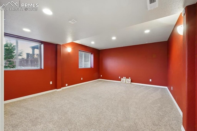 13080 Mt Harvard Dr, Peyton, CO 80831 - carpeted spare room with baseboards and recessed lighting