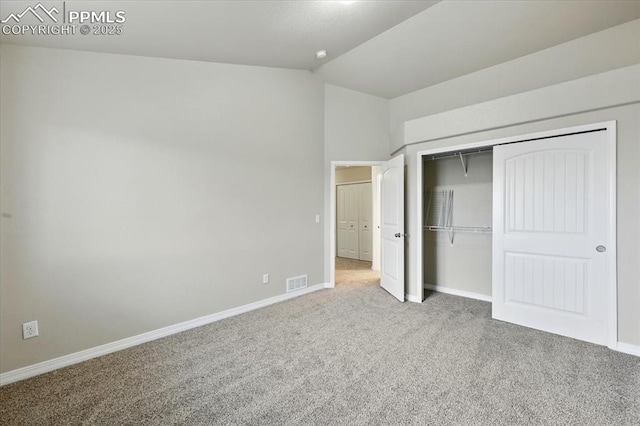 13080 Mt Harvard Dr, Peyton, CO 80831 - unfurnished bedroom with carpet, vaulted ceiling, and a closet
