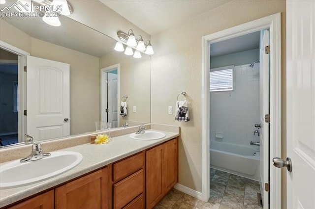 13080 Mt Harvard Dr, Peyton, CO 80831 - bathroom featuring double vanity and shower / washtub combination