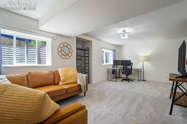 2852 Front Royal Dr, Colorado Springs, CO 80919 - carpeted living area with an office area and baseboards