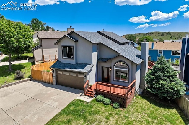 2852 Front Royal Dr, Colorado Springs, CO 80919 - view of front facade with a chimney, stucco siding, driveway, roof with shingles, and a garage
