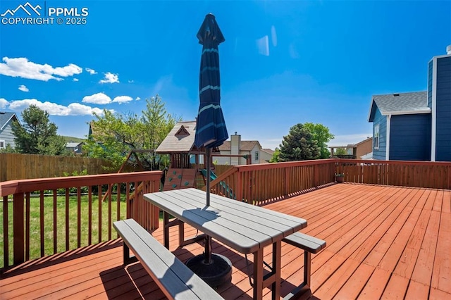 2852 Front Royal Dr, Colorado Springs, CO 80919 - deck with a playground and outdoor dining space