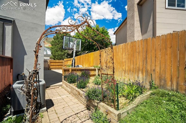 2852 Front Royal Dr, Colorado Springs, CO 80919 - fenced backyard featuring a vegetable garden