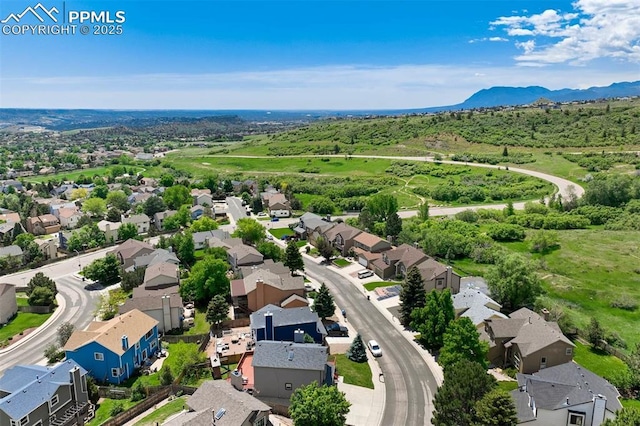 2852 Front Royal Dr, Colorado Springs, CO 80919 - aerial perspective of suburban area with a mountainous background
