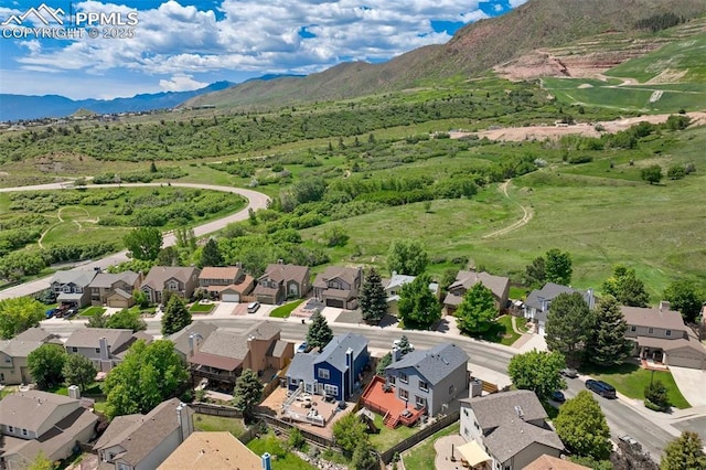 2852 Front Royal Dr, Colorado Springs, CO 80919 - aerial perspective of suburban area featuring a mountain backdrop
