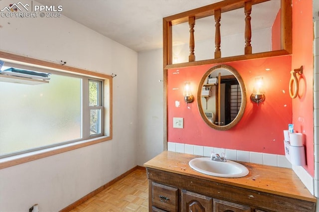 125 1st St, Saguache, CO 81149 - bathroom featuring vanity and baseboards