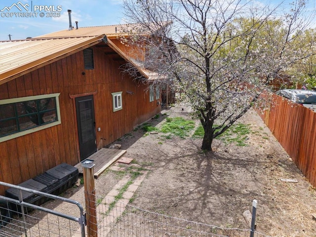 125 1st St, Saguache, CO 81149 - view of side of property featuring a metal roof