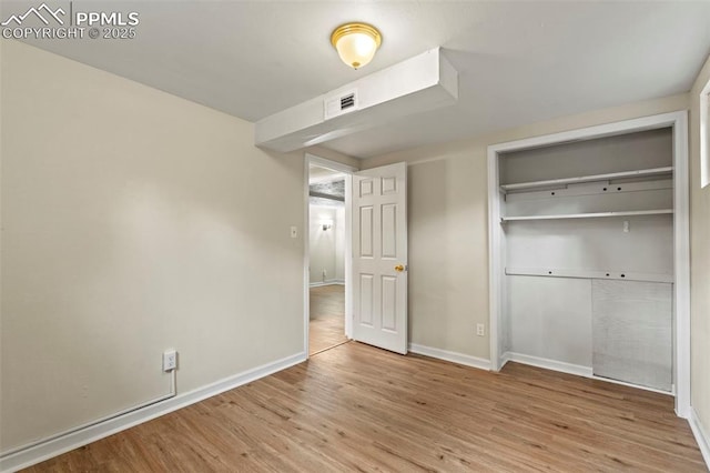 110 Fordham St, Colorado Springs, CO 80911 - unfurnished bedroom featuring wood finished floors and a closet