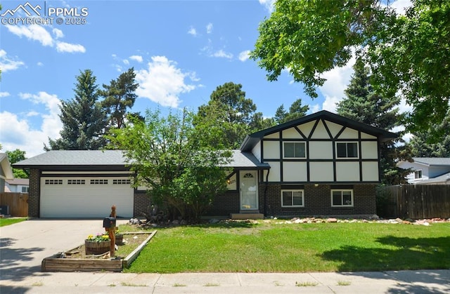 4075 Undimmed Cir, Colorado Springs, CO 80917 - view of front facade with brick siding, a garage, and concrete driveway