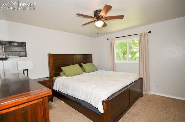 4075 Undimmed Cir, Colorado Springs, CO 80917 - carpeted bedroom with an AC wall unit and a ceiling fan