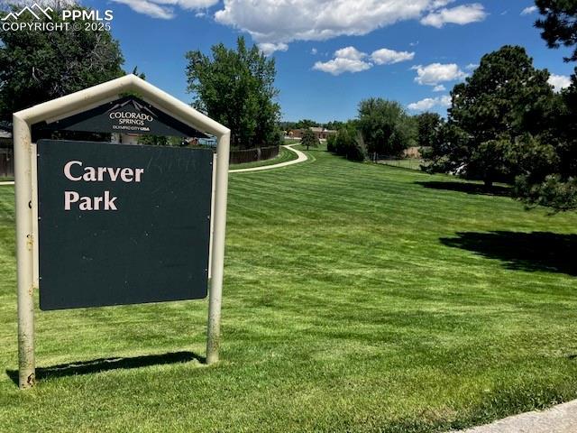 4075 Undimmed Cir, Colorado Springs, CO 80917 - community sign with a yard