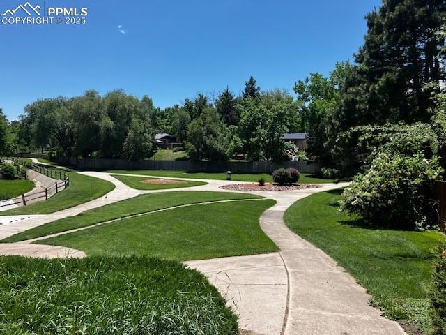 4075 Undimmed Cir, Colorado Springs, CO 80917 - view of community featuring a lawn