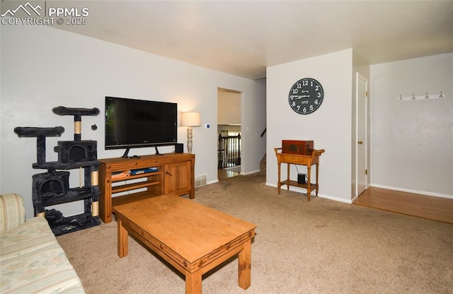 4075 Undimmed Cir, Colorado Springs, CO 80917 - carpeted living area with baseboards