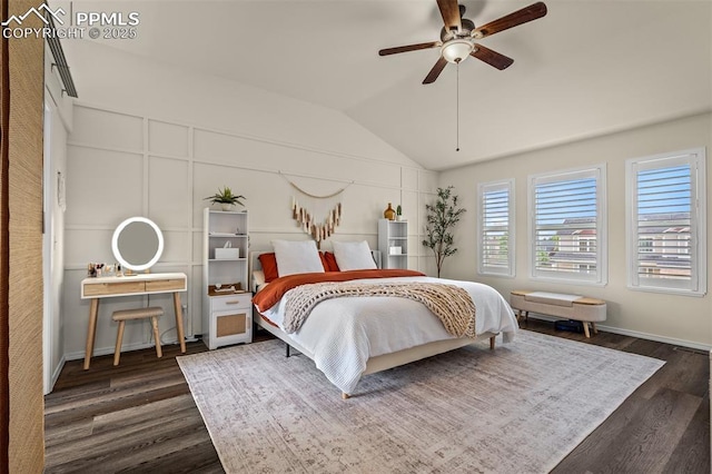 2570 Wimbleton Ct, Colorado Springs, CO 80920 - bedroom with dark wood-style floors, lofted ceiling, and ceiling fan