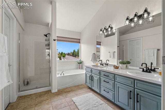 2570 Wimbleton Ct, Colorado Springs, CO 80920 - bathroom with double vanity, a bath, a shower stall, lofted ceiling, and tile patterned floors