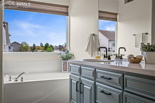 2570 Wimbleton Ct, Colorado Springs, CO 80920 - full bathroom with vanity and a garden tub