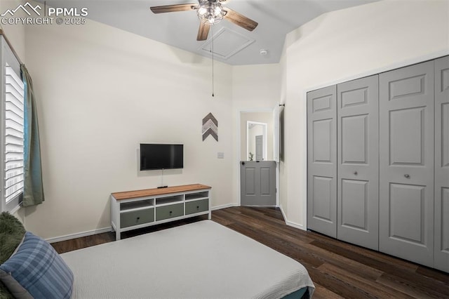 2570 Wimbleton Ct, Colorado Springs, CO 80920 - bedroom with attic access, dark wood-style flooring, multiple windows, a closet, and vaulted ceiling