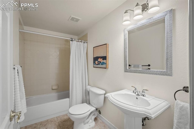 2570 Wimbleton Ct, Colorado Springs, CO 80920 - full bath featuring shower / bath combo with shower curtain and tile patterned floors
