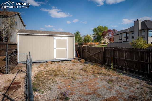 2570 Wimbleton Ct, Colorado Springs, CO 80920 - fenced backyard with a storage unit and a residential view