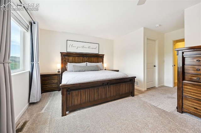 1914 Birmingham Loop, Colorado Springs, CO 80910 - bedroom featuring light carpet and ceiling fan