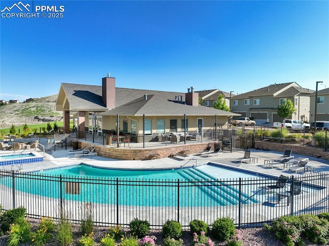 1914 Birmingham Loop, Colorado Springs, CO 80910 - community pool featuring a patio