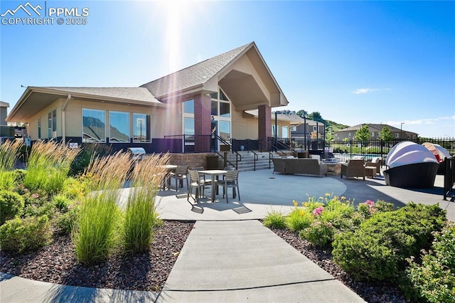 1914 Birmingham Loop, Colorado Springs, CO 80910 - back of house with a patio area