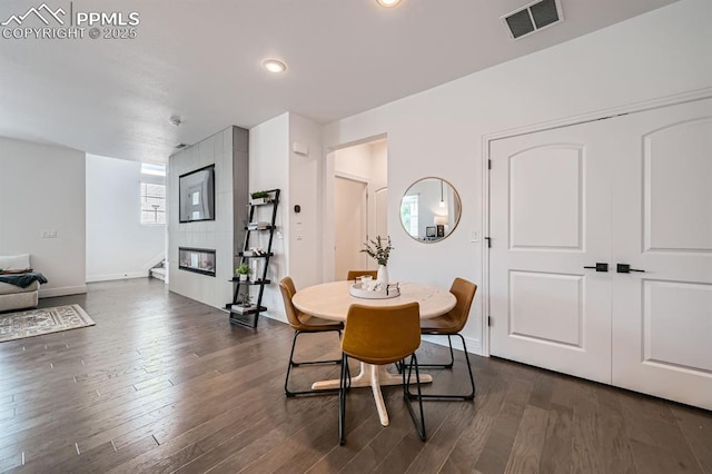 1851 Spring Water Pt, Colorado Springs, CO 80908 - dining space featuring dark wood-type flooring and recessed lighting
