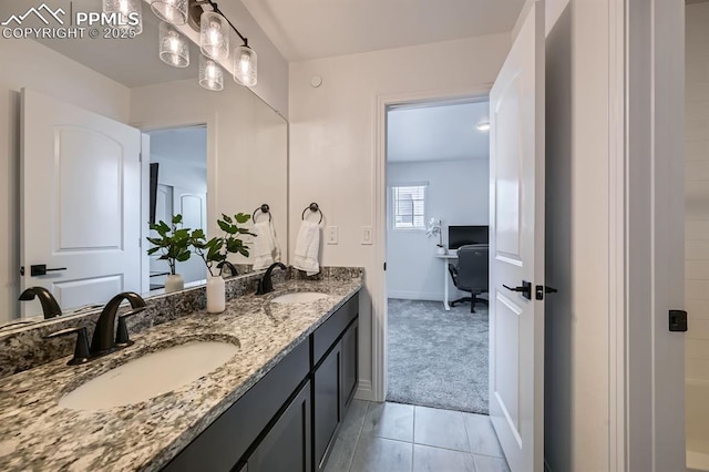 1851 Spring Water Pt, Colorado Springs, CO 80908 - bathroom with double vanity and tile patterned flooring