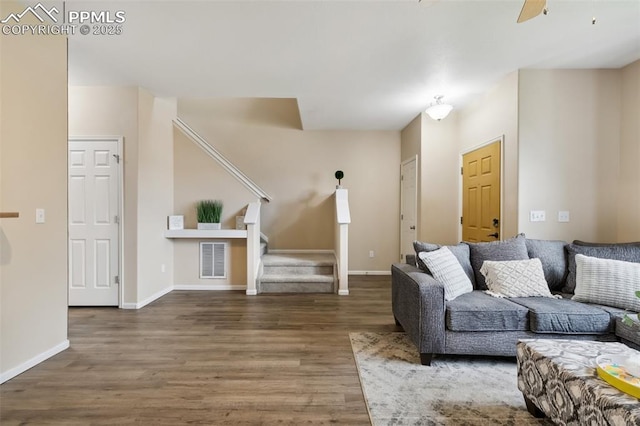 7524 Sandy Springs Pt, Fountain, CO 80817 - living room featuring stairway, wood finished floors, and a ceiling fan