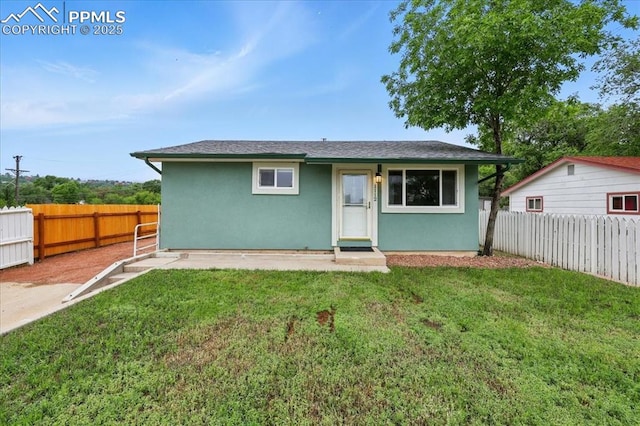 1112 Modes St, Colorado Springs, CO 80904 - view of front of property featuring stucco siding