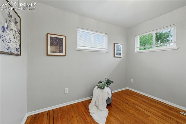 1112 Modes St, Colorado Springs, CO 80904 - spare room with wood finished floors and baseboards