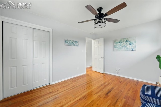 1112 Modes St, Colorado Springs, CO 80904 - unfurnished bedroom with light wood-style floors, baseboards, a closet, and ceiling fan