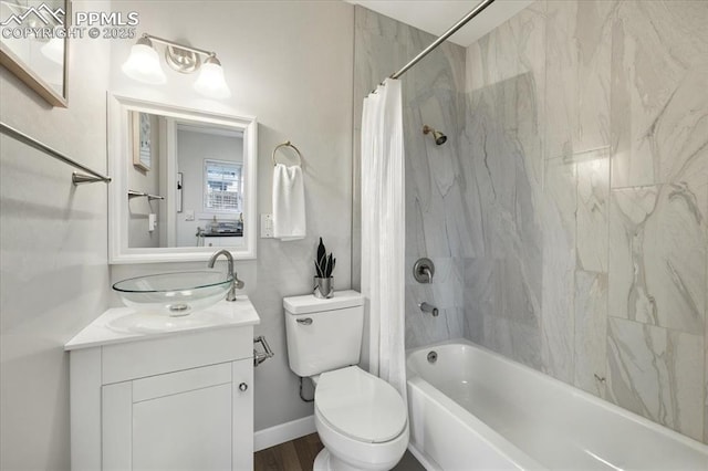 1112 Modes St, Colorado Springs, CO 80904 - bathroom featuring vanity, shower / tub combo, and toilet