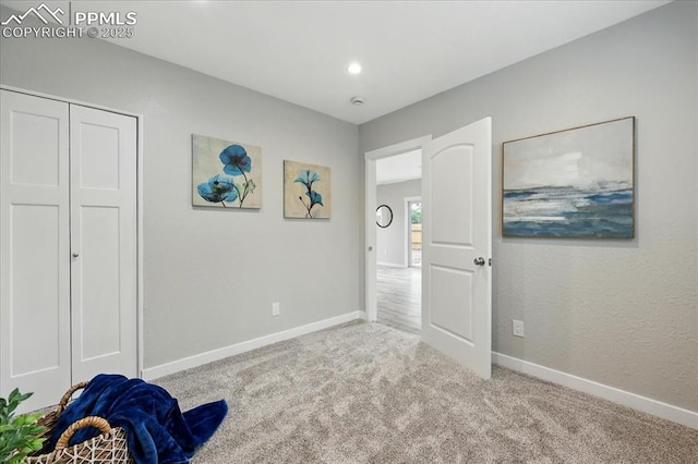 1112 Modes St, Colorado Springs, CO 80904 - unfurnished bedroom with carpet, baseboards, a closet, and recessed lighting