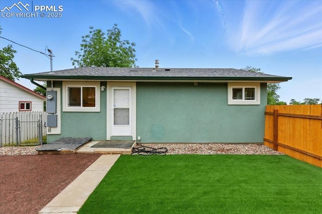 1112 Modes St, Colorado Springs, CO 80904 - view of front of house featuring stucco siding