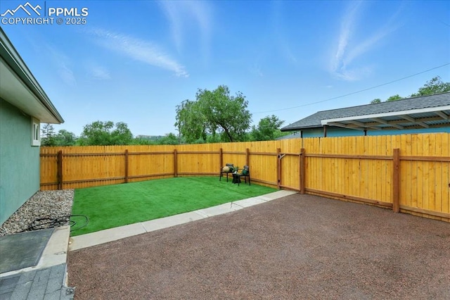 1112 Modes St, Colorado Springs, CO 80904 - view of yard featuring a patio