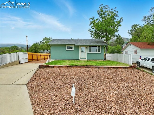 1112 Modes St, Colorado Springs, CO 80904 - view of front facade with stucco siding