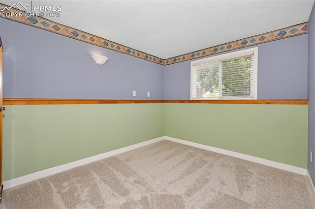 4059 Cooke Ln, Colorado Springs, CO 80911 - carpeted spare room featuring a textured ceiling