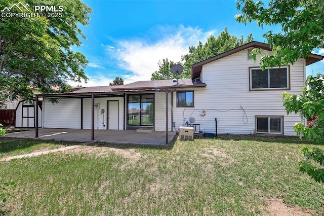 4059 Cooke Ln, Colorado Springs, CO 80911 - back of property with a shed, a lawn, and a patio