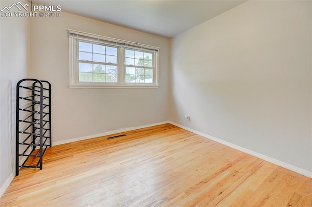 3118 E Ln Salle St, Colorado Springs, CO 80909 - empty room with wood finished floors