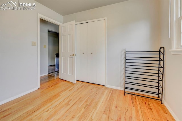 3118 E Ln Salle St, Colorado Springs, CO 80909 - unfurnished bedroom with wood finished floors and a closet